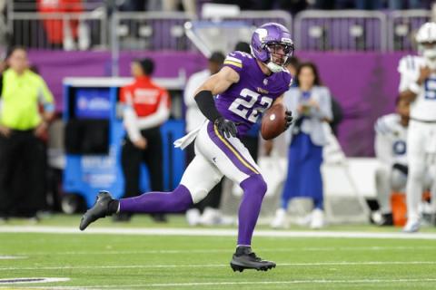 Minnesota Vikings safety Harrison Smith (22) carries the football upfield at U.S. Bank Stadium.