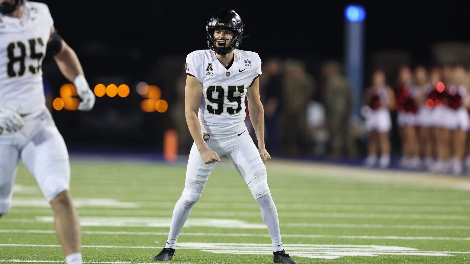 Army kicker Dawson Jones, No. 95 in a white uniform and black helmet, reacts on the field during Army's 38-35 win at Tulsa on Oct. 23, 2026.