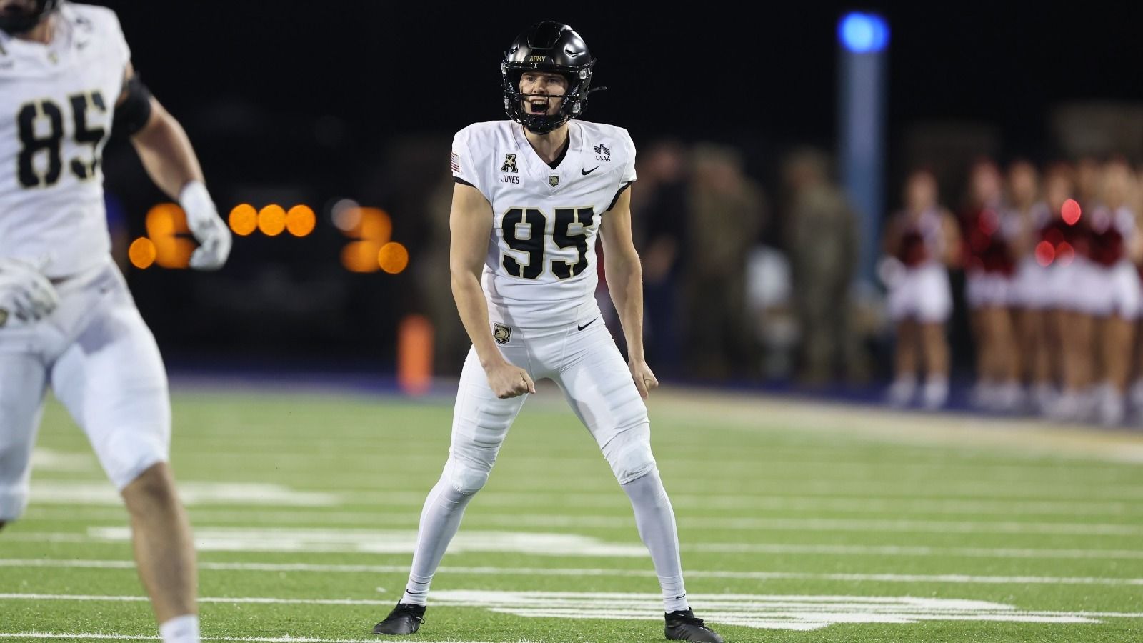 Army kicker Dawson Jones, No. 95 in a white uniform and black helmet, reacts on the field during Army's 38-35 win at Tulsa on Oct. 23, 2026.