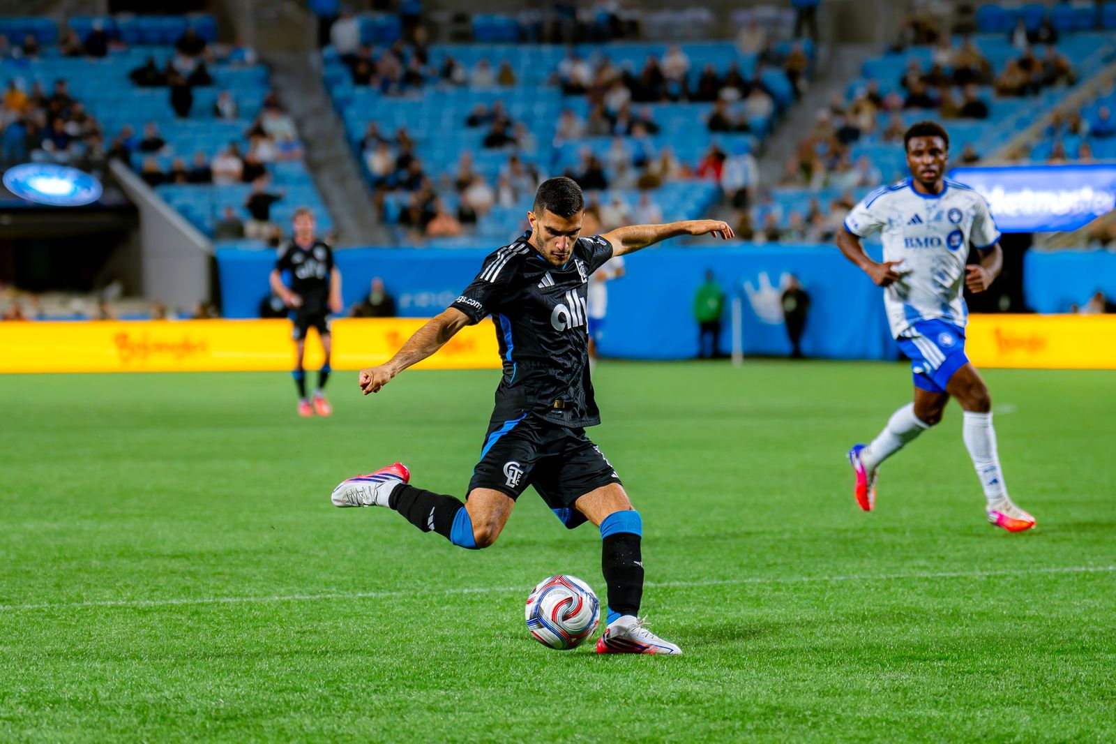A Charlotte FC player winds up to strike the ball against CF Montréal at Bank of America Stadium — Photo Credit: Arturo Rosales Sevilla/Undrafted