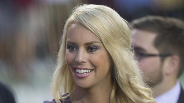 Britt McHenry smiles on the field before a Lions-Redskins preseason game in August 2015.