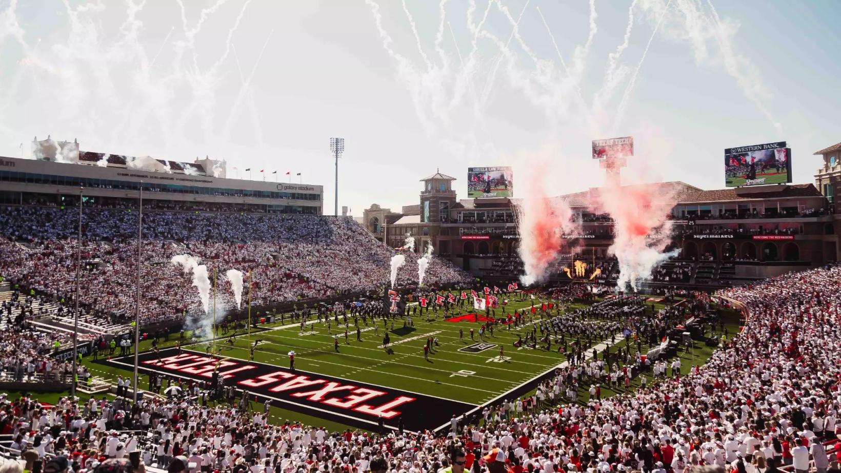 Texas Tech takes the field amid fireworks and smoke in front of a sold-out Galaxy Stadium crowd, 2026 file photo