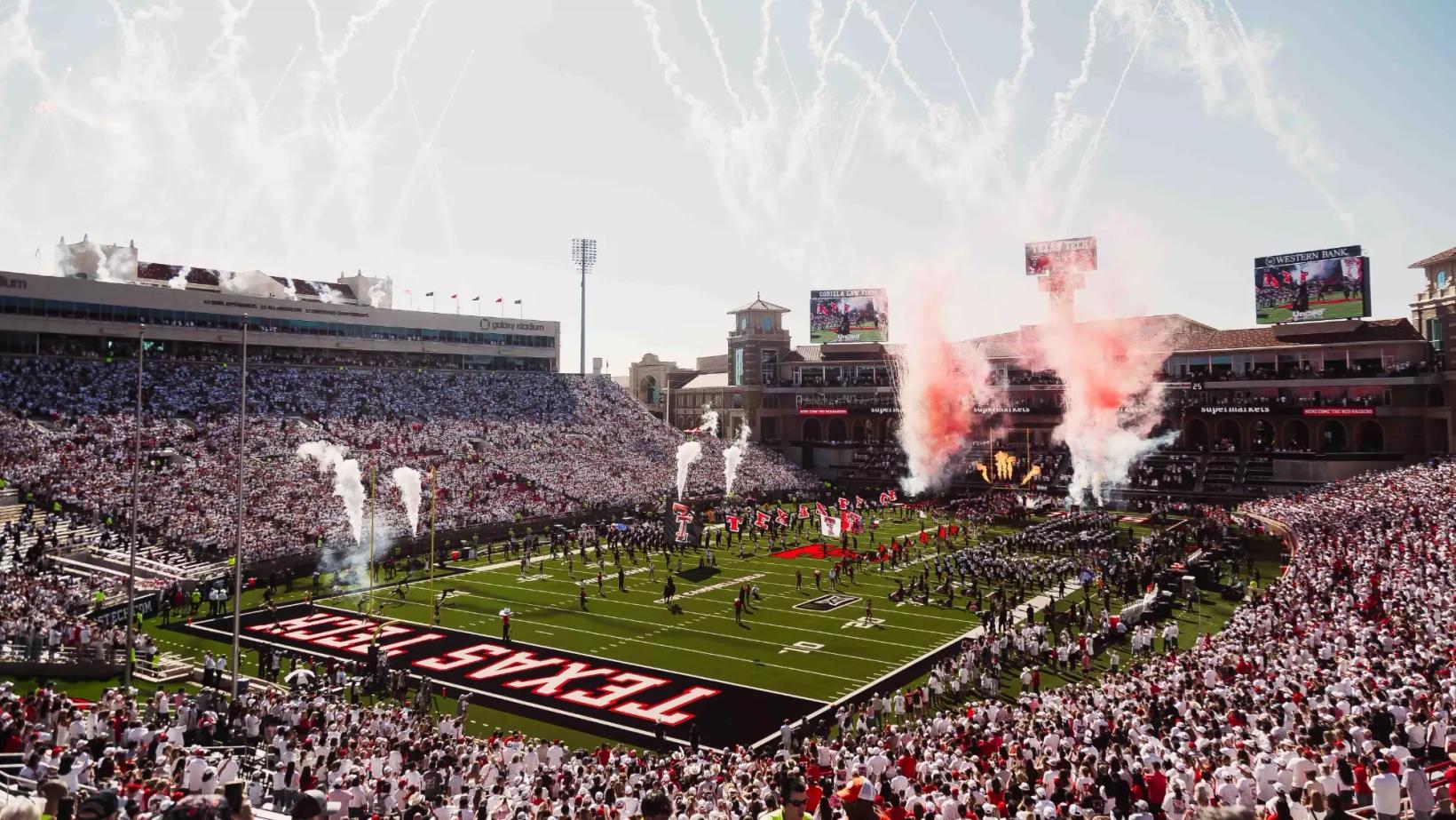 Texas Tech takes the field amid fireworks and smoke in front of a sold-out Galaxy Stadium crowd, 2026 file photo