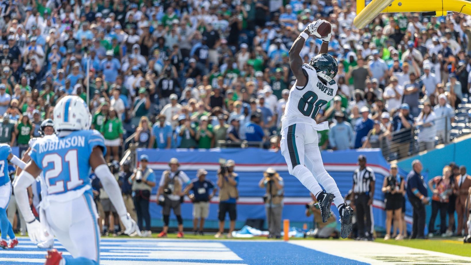 Philadelphia Eagles wide receiver Darius Cooper (80) leaps to catch a pass in the end zone as Tennessee Titans defender Micah Robinson (21) looks on at Nissan Stadium.