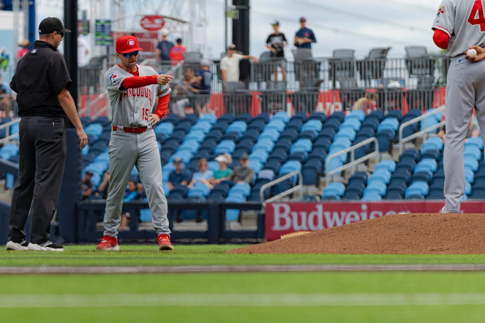 Field-level action — Vancouver Canadians vs Hillsboro Hops — Photo Credit: Aaron Leopold/Undrafted