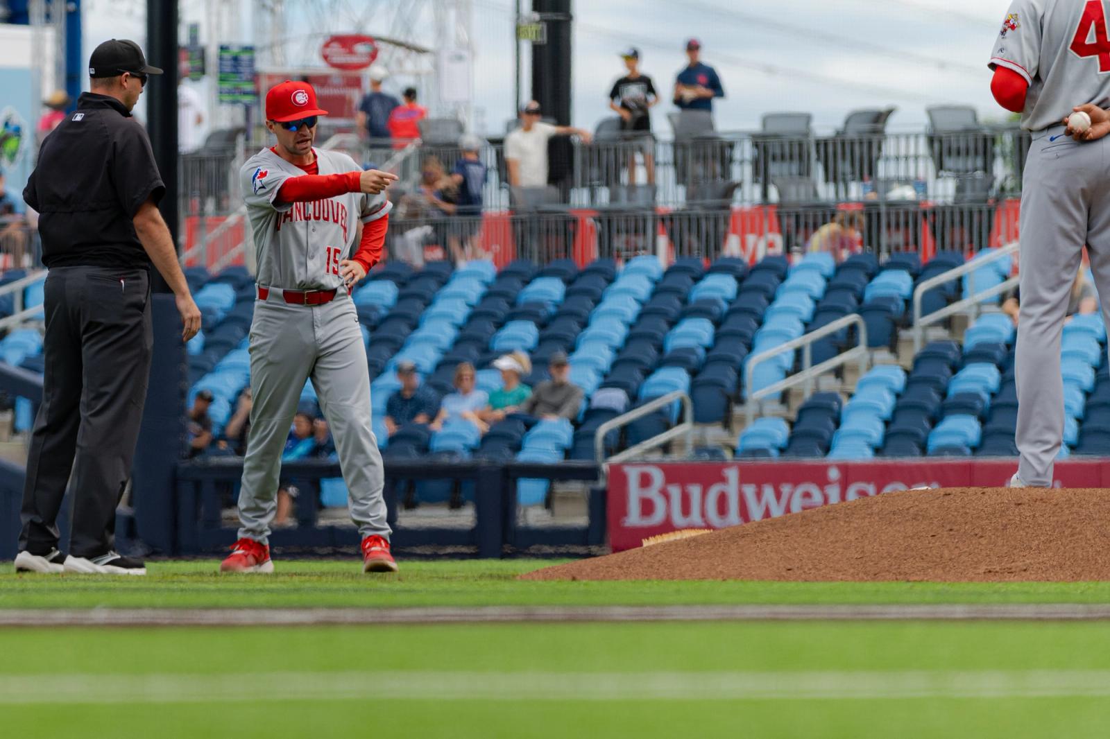 Field-level action — Vancouver Canadians vs Hillsboro Hops — Photo Credit: Aaron Leopold/Undrafted