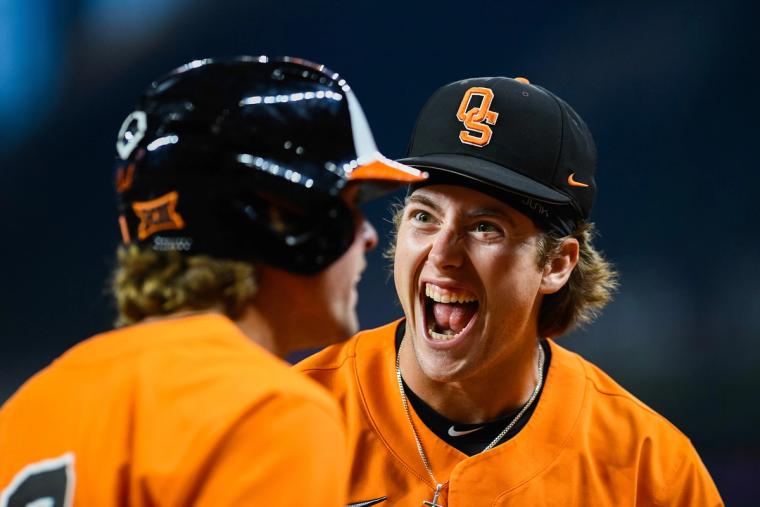 Oklahoma State baseball players celebrate during Bedlam