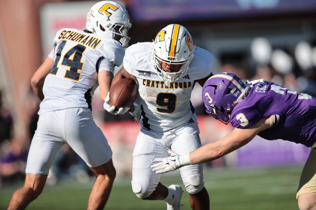 Chattanooga running back Kevin Lalin (9) carries the ball as a Western Carolina defender reaches for him during the Mocs' 41-18 win in Cullowhee, N.C., on Oct. 24, 2026