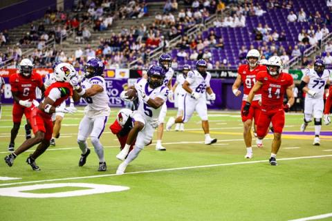Northern Iowa's Xavier Terrell, wearing No. 5 in a white jersey, carries the ball against Illinois State in the UNI-Dome on Sept. 26, 2026 (file photo)