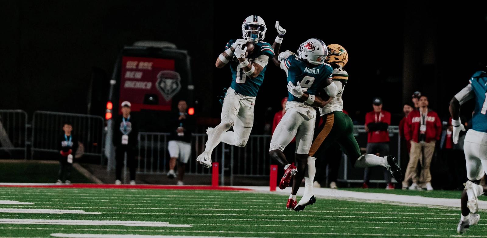 New Mexico safety Austin Brawley (0) leaps for the ball against North Dakota State at University Stadium in Albuquerque on Oct. 24, 2026.