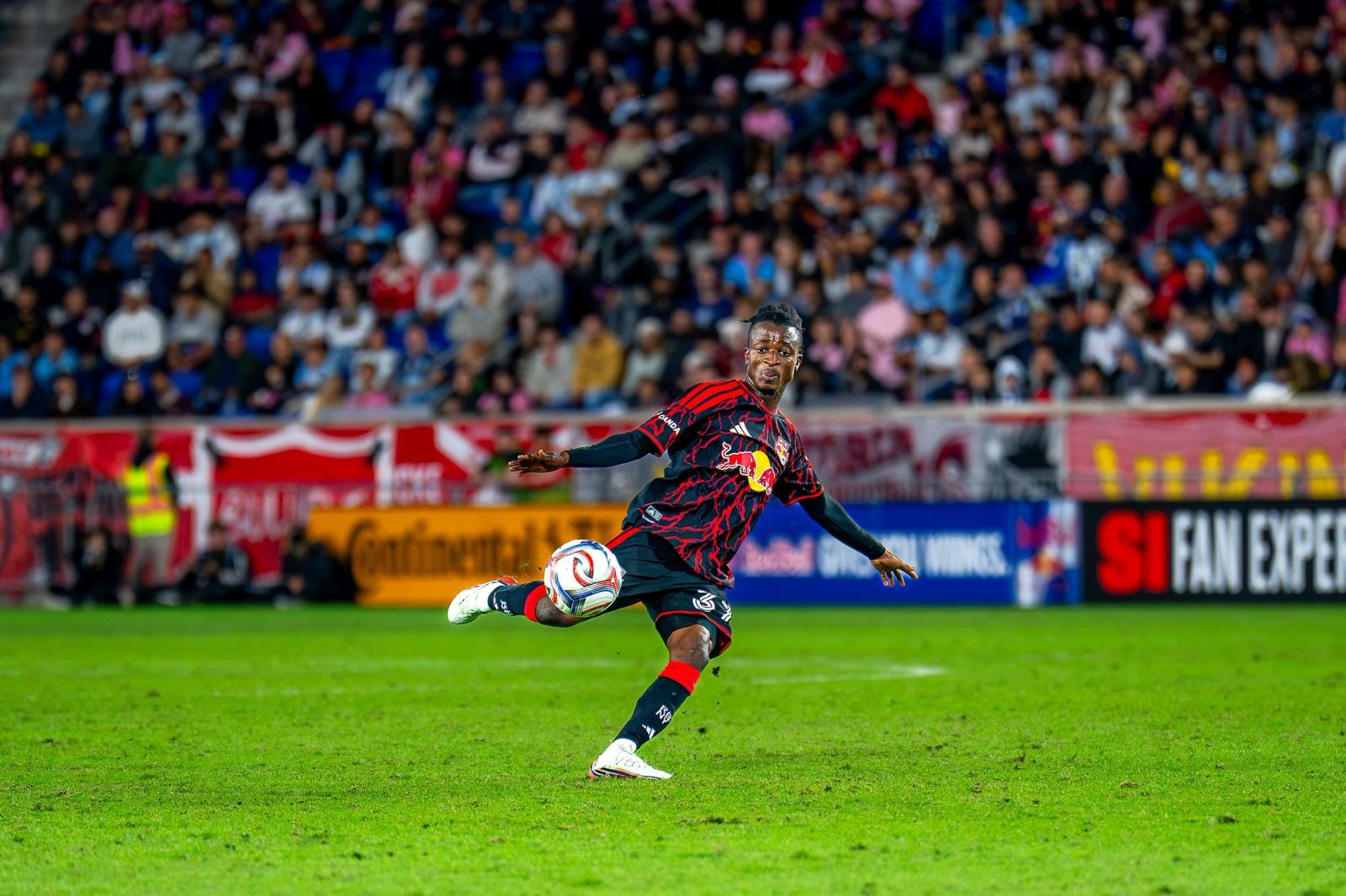 A Red Bull New York player strikes the ball during the match against Inter Miami at Sports Illustrated Stadium on October 24, 2026.