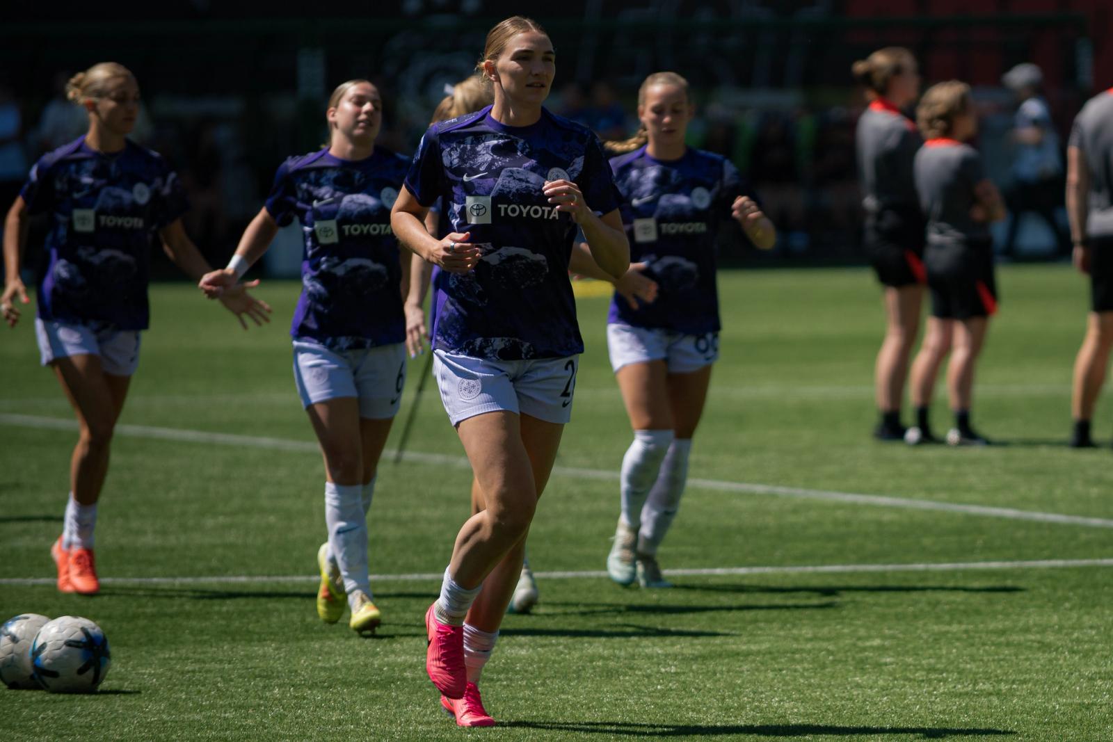Match action — Portland Thorns vs Racing Louisville — Photo Credit: Aaron Leopold/Undrafted