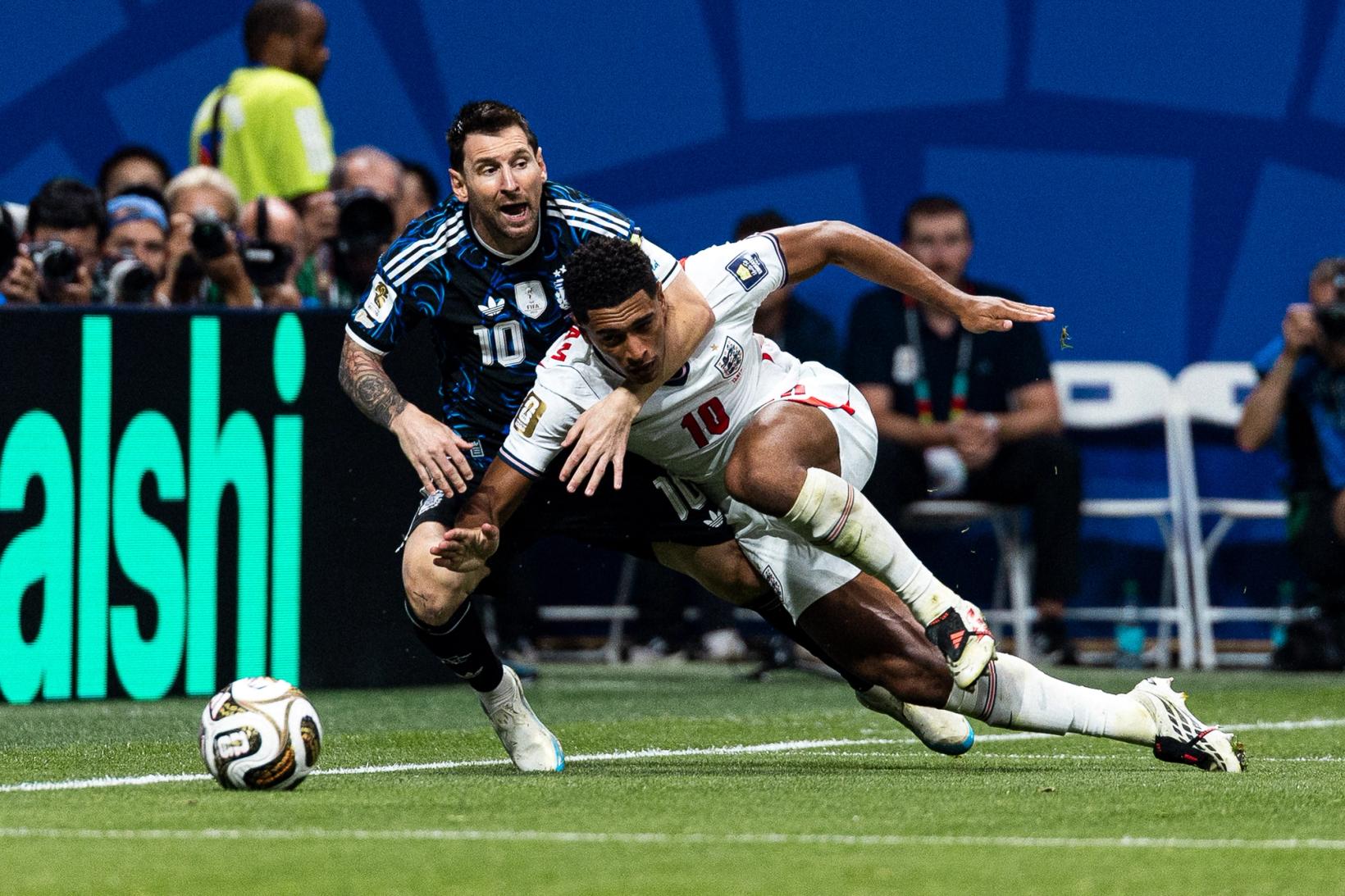 Argentina's Lionel Messi and England's Jude Bellingham, both wearing No. 10, challenge for the ball during the World Cup semifinal on July 15, 2026 at Mercedes-Benz Stadium in Atlanta.