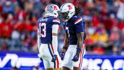Arizona defenders Cam Chapa (13) and Chase Kennedy (7) celebrate a play during the No. 25 Wildcats' 39-3 win over Iowa State at Casino Del Sol Stadium in Tucson on October 24, 2026.