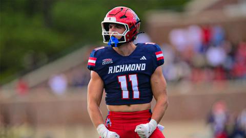A Richmond defender in a navy No. 11 jersey celebrates during the Spiders' 13-6 Homecoming win over Colgate on Oct. 24, 2026.