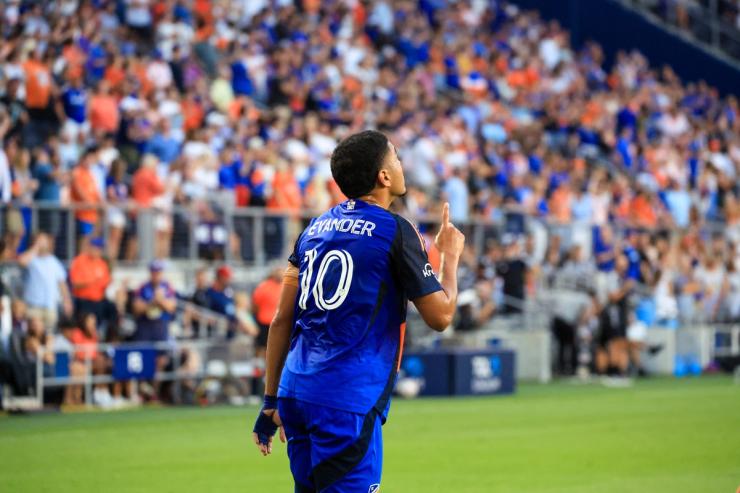FC Cincinnati's Evander points to the sky while celebrating his goal against the Seattle Sounders during the August 22, 2026 match at TQL Stadium.