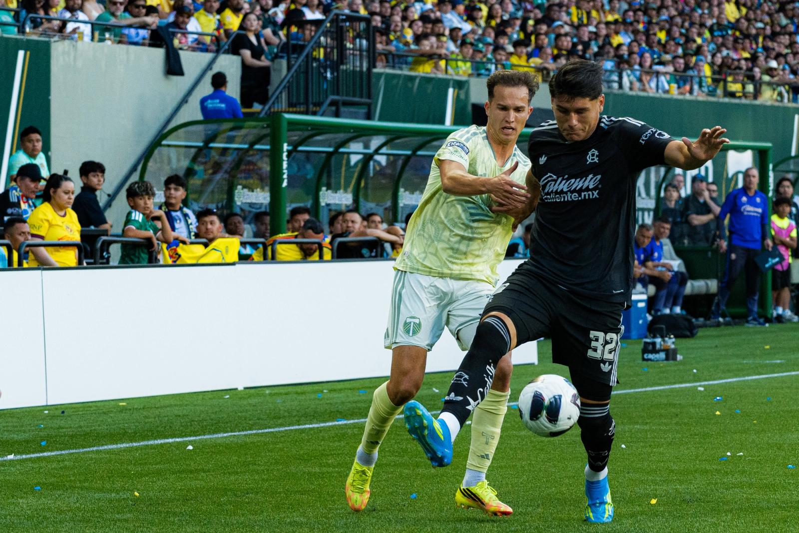 Club America and Portland Timbers midfield battle — Photo Credit: Aaron Leopold/Undrafted