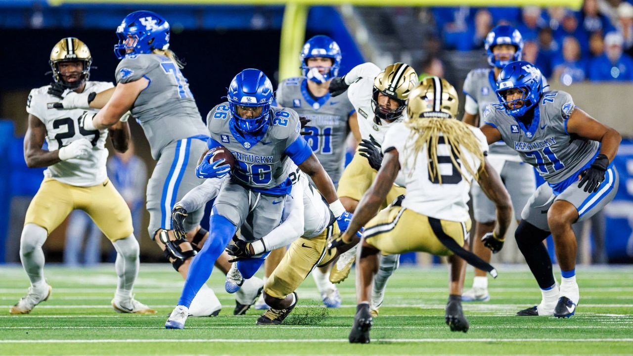 Kentucky running back Jason Patterson carries the ball through Vanderbilt defenders at Kroger Field on Oct. 24, 2026.