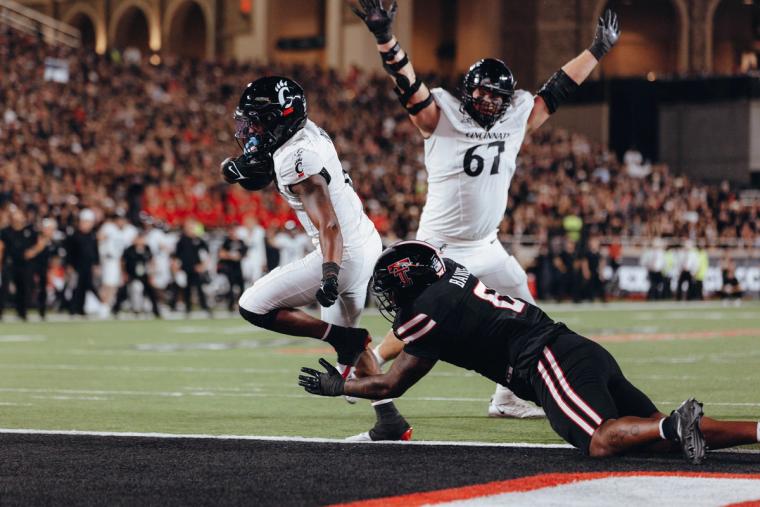Cincinnati Football Falls Short Against Texas Tech in High-Scoring Thriller
