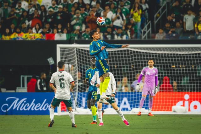 Colombia player rises for a header against Mexico at M&T Bank Stadium — Photo Credit: Arturo Rosales Sevilla/Undrafted