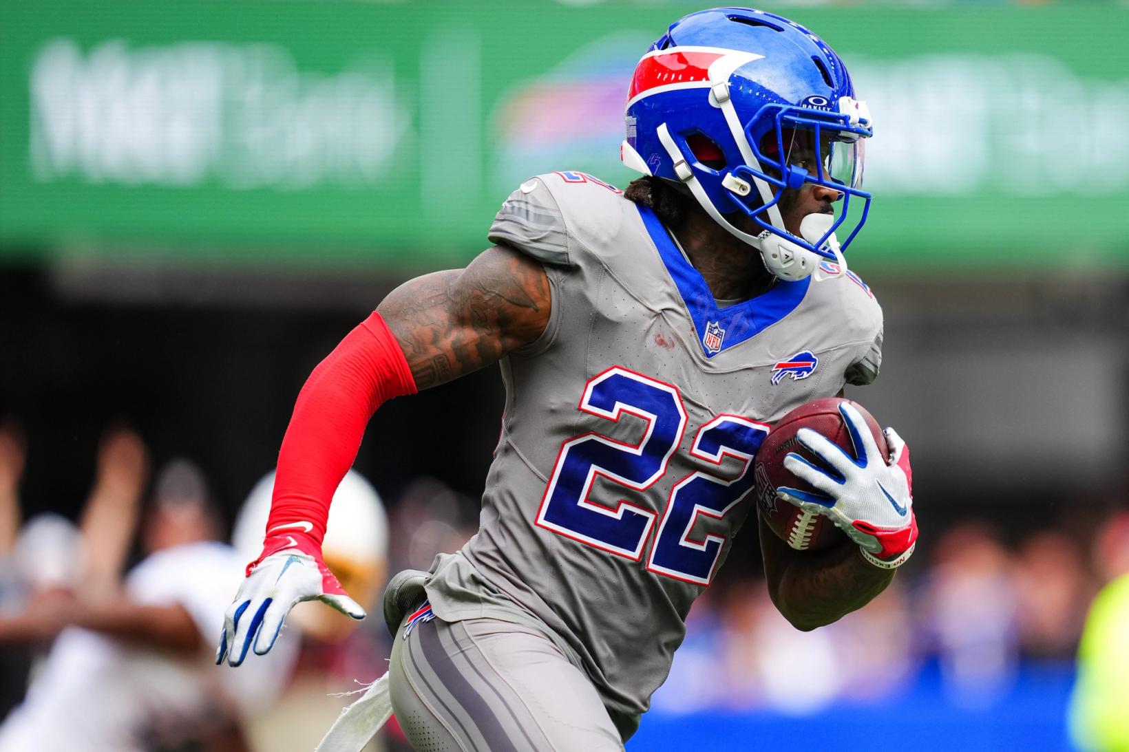 Buffalo Bills safety C.J. Gardner-Johnson (22) runs with the ball in a gray Bills uniform at Highmark Stadium