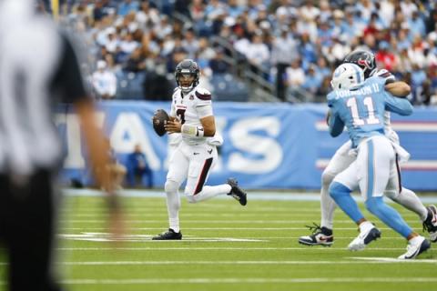Houston Texans quarterback C.J. Stroud (7) looks to pass against the Tennessee Titans at Nissan Stadium