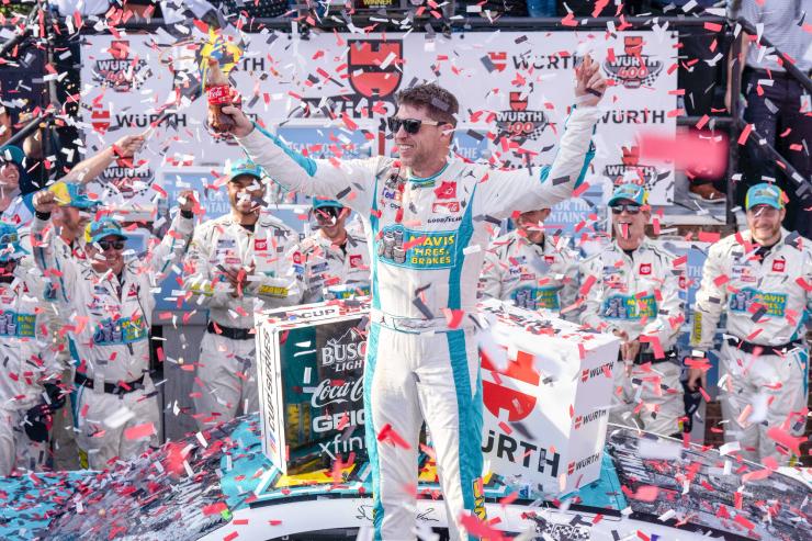 Denny Hamlin's Climbing Triumph: A Milestone at Dover Motor Speedway