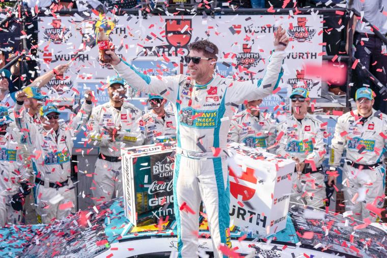 Denny Hamlin's Climbing Triumph: A Milestone at Dover Motor Speedway
