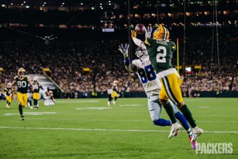 Green Bay Packers cornerback Brandon Cisse (2) leaps in front of Dallas Cowboys receiver CeeDee Lamb (88) for a pass at Lambeau Field.
