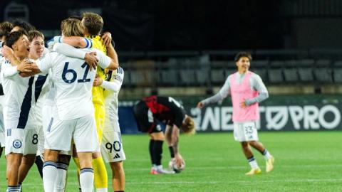 Ventura County FC players in white embrace in celebration at Providence Park during the MLS NEXT Pro Western Conference Semifinal against Portland Timbers2 on October 25, 2026.
