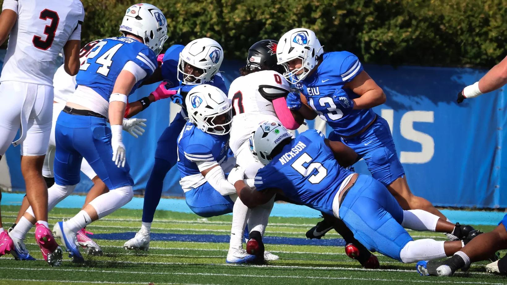 Eastern Illinois defenders in blue swarm a Southeast Missouri ball carrier at O'Brien Field during the Redhawks' 20-10 win on Oct. 24, 2026