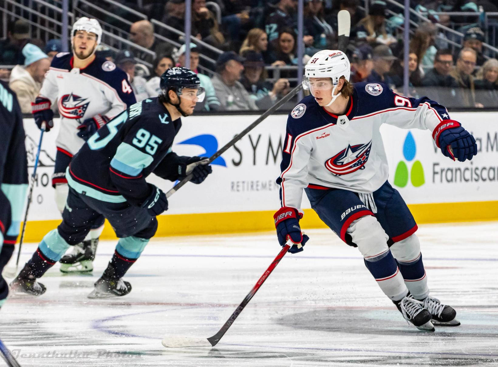 Columbus Blue Jackets forward Kent Johnson skates during a game against the Seattle Kraken in Seattle on January 28, 2024.