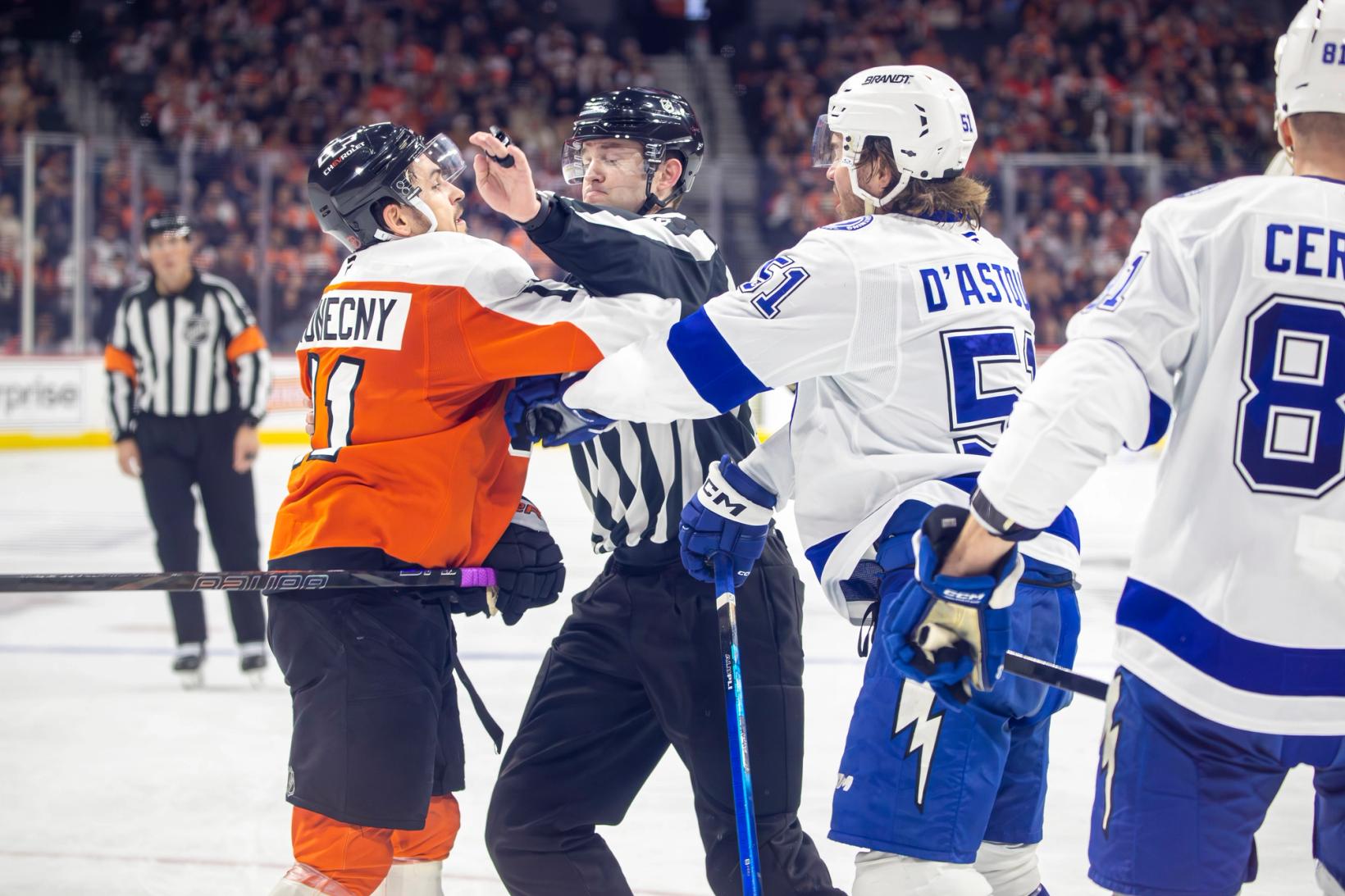 The Flyers' Nikita Grebenkin and the Lightning's Max Crozier drop the gloves during the January 12, 2026 game at Xfinity Mobile Arena in Philadelphia.