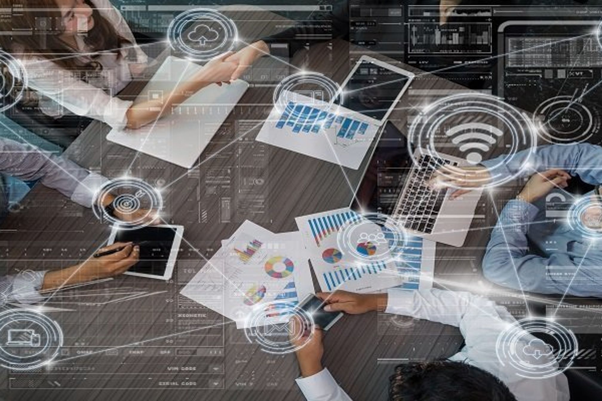 technology business internet of thing concept, technology digital virtual screen and Wireless communication connecting over the Top view of Business People Group on a Meeting in the modern office,