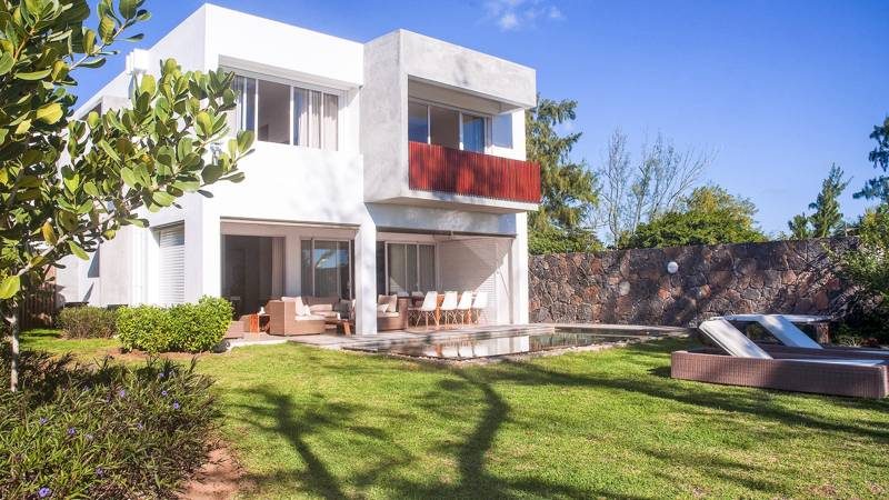 Villa charmante à l’Île Maurice, avec une architecture typique et un grand espace extérieur.