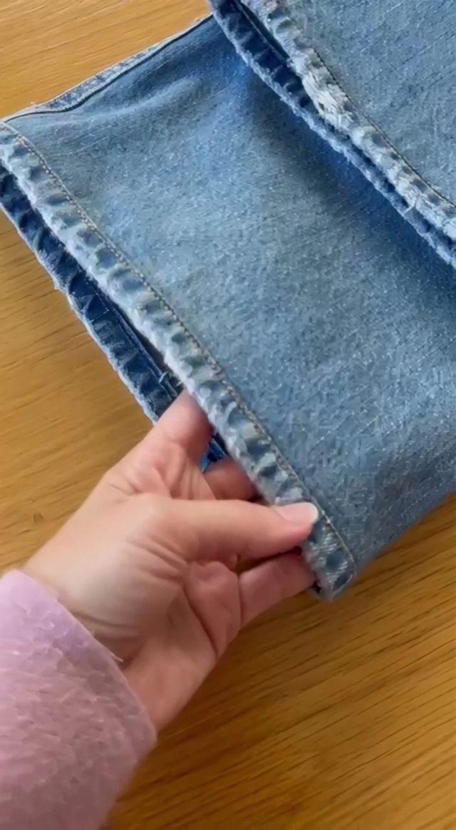 After: the leg shortened, with the original frayed hem stitched back on