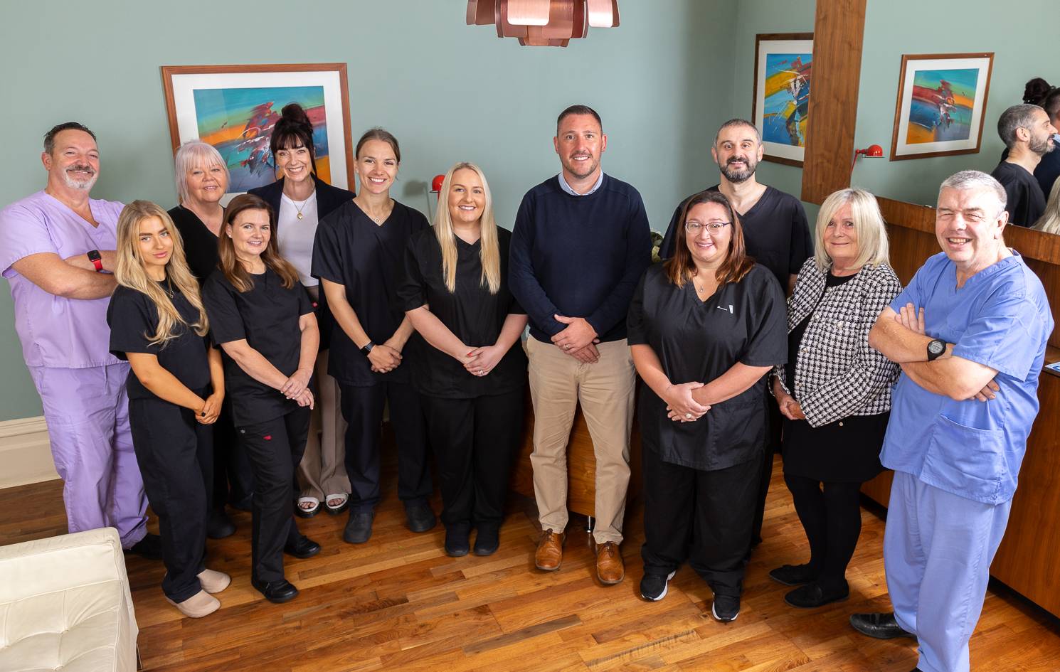 Pontcanna Dental Care team photo with dentists, nurses and non clinical team in reception