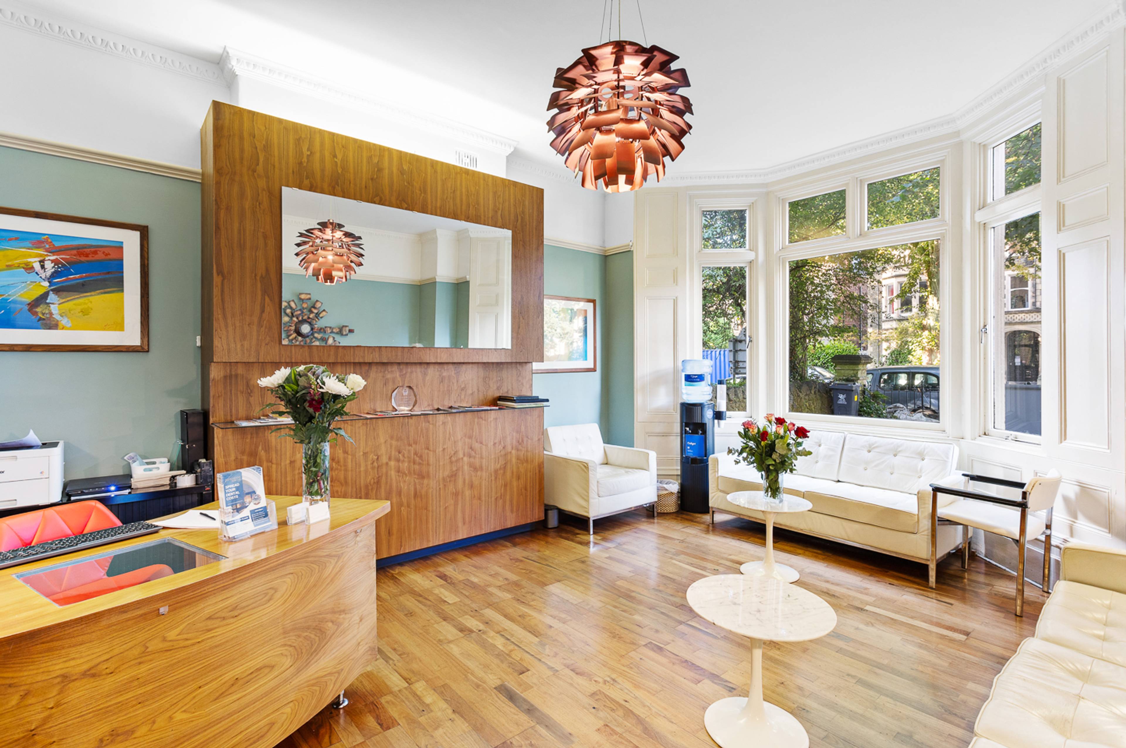 Pontcanna Dental Care reception and lounge with big bright windows
