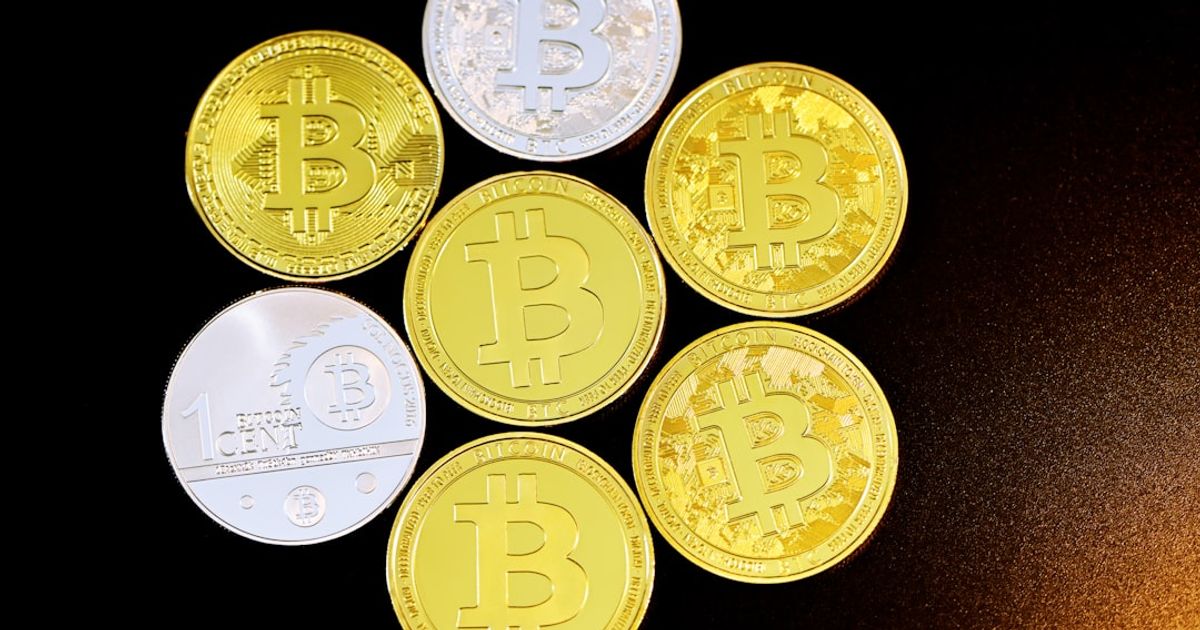 Bitcoin Dips Below $70,000 Amid Central Bank Inflation Concerns