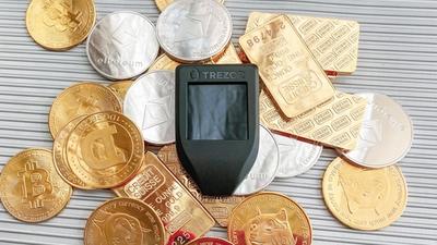 Bitcoin and Gold Slide 3% and 2% — Rate Hike Bets Rattle Markets