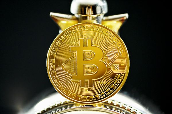 Bitcoin Stabilizes Near $67,000 Amid ETF Investor Losses