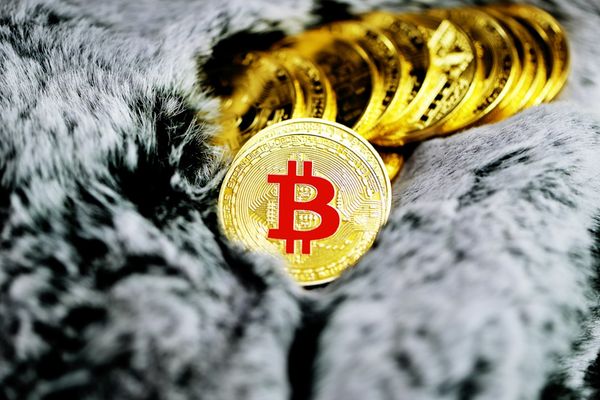 Bitcoin Surges to $77K Amid $2B ETF Outflows — Markets Brace for More Volatility