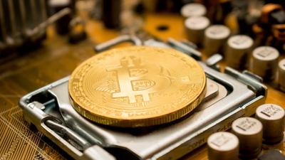 Dollar Index Hits Year High, Bitcoin Wavers Amid Fed's Hawkish Tone