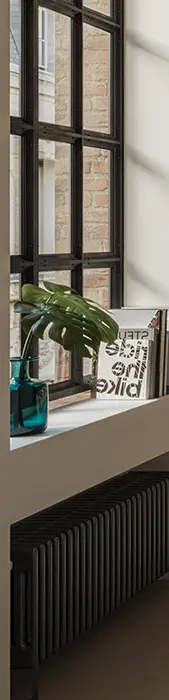 Stockholm Technic sideboard beside a window