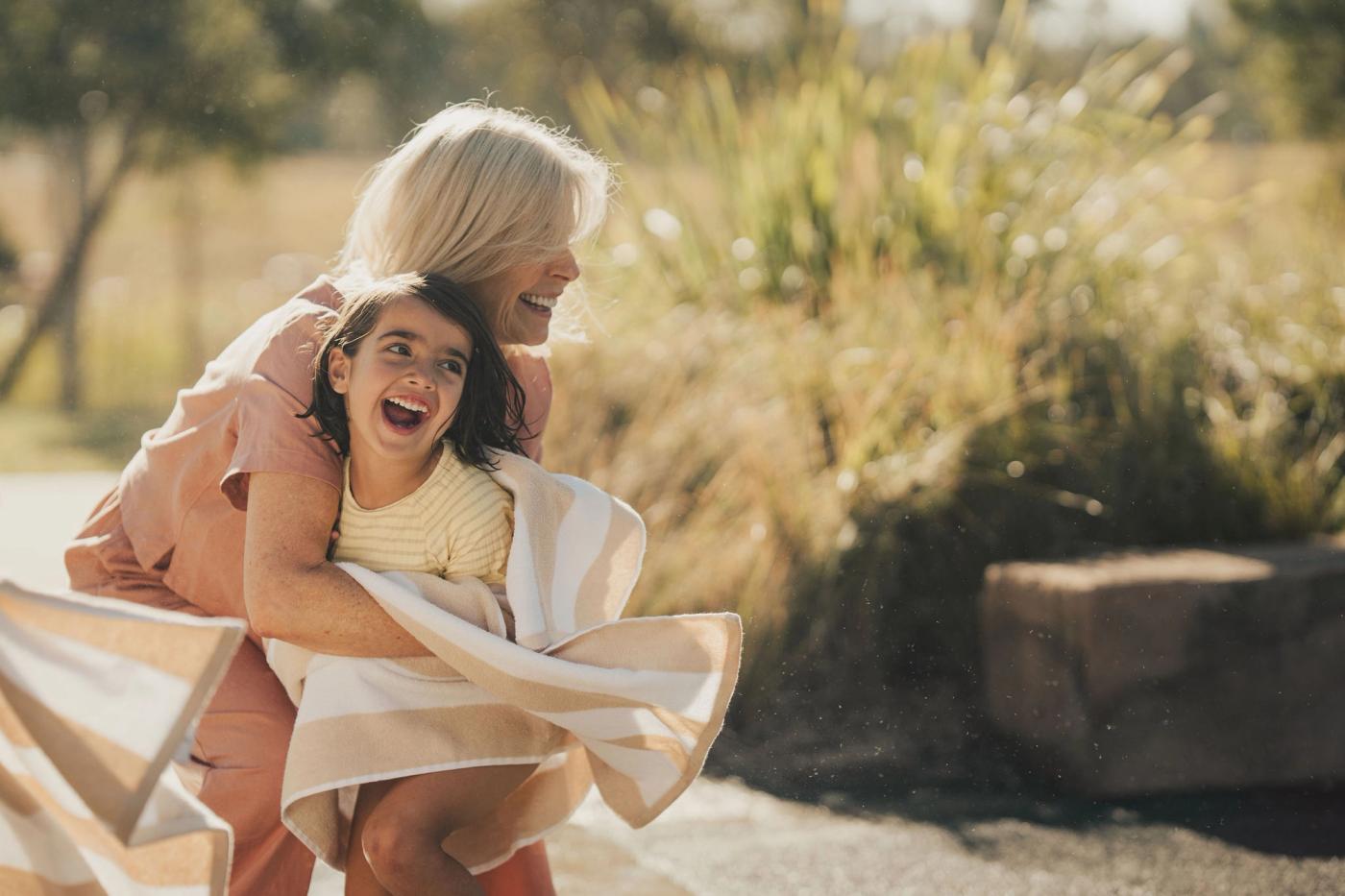 A girl hugging her grandma