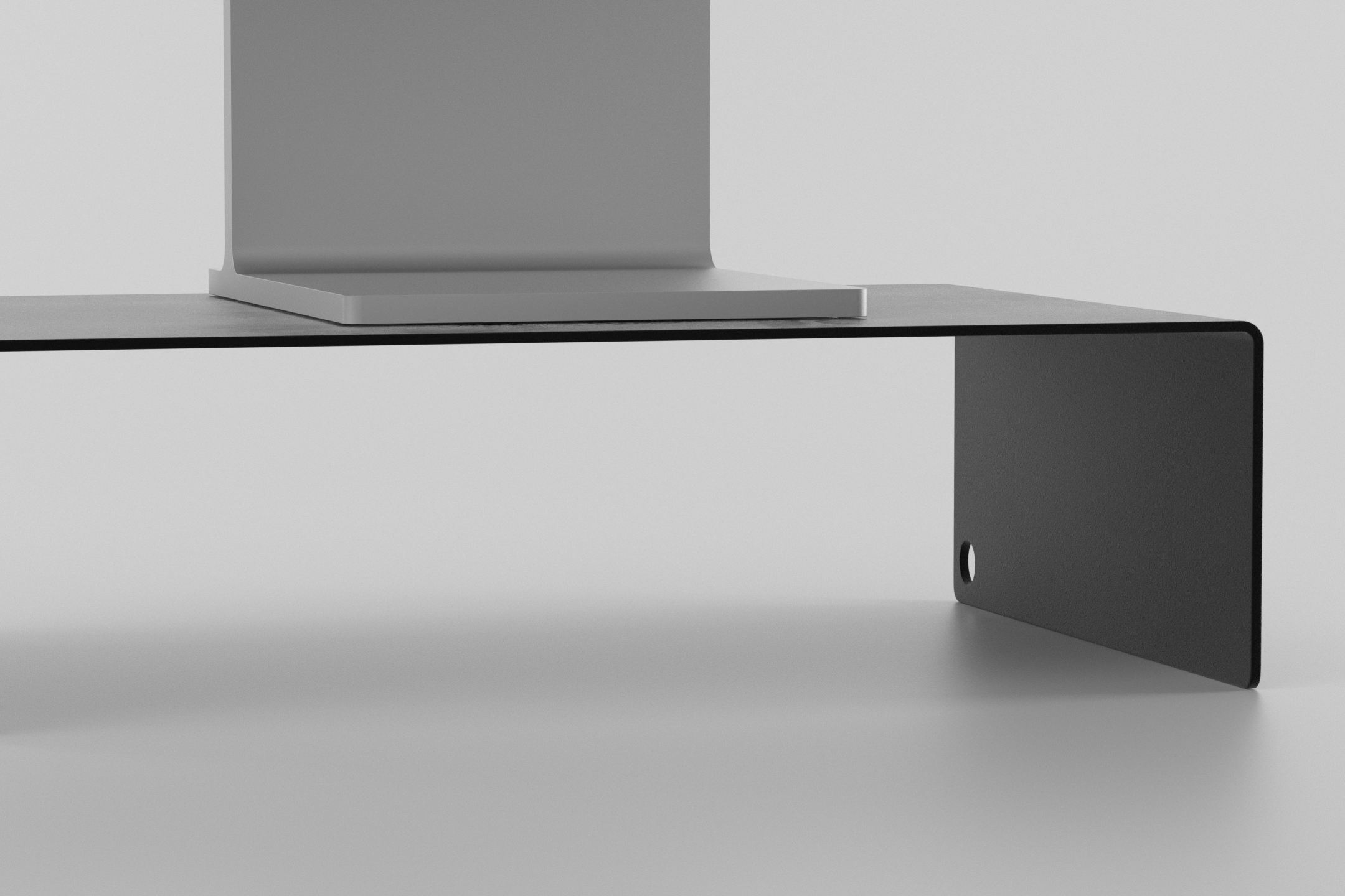 The Monitor Stand - black with display on it