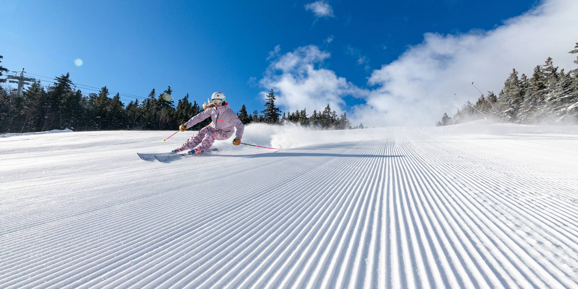 Skier on a groomed run at Sunday River