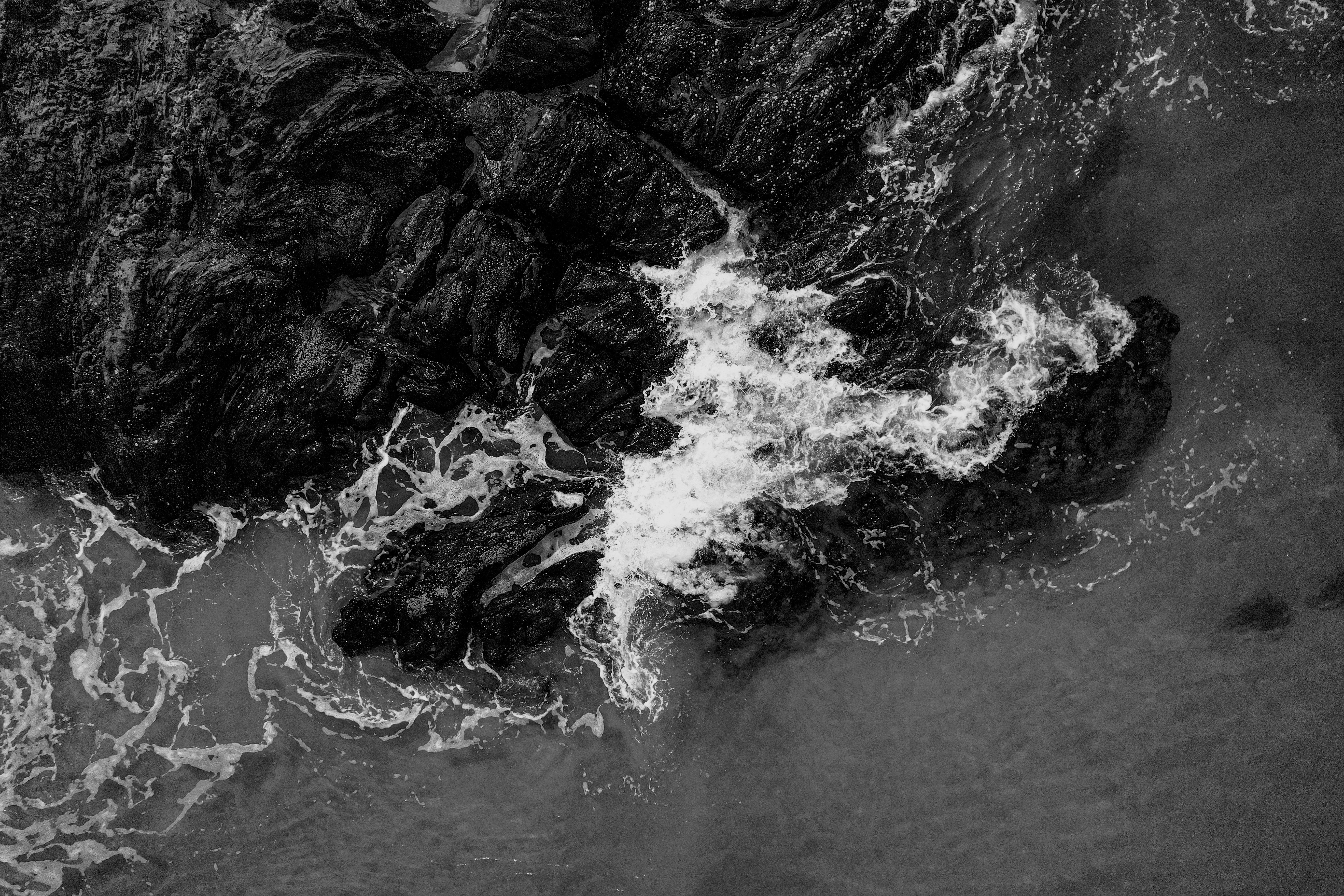 waves crashing at rocks 