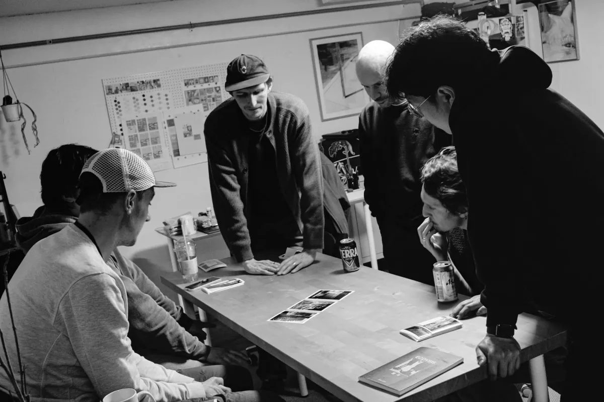Chris da Canha and Jitse Jager discuss photography with a group of people at Polite Company Press Studio in Mangwon-dong, Seoul
