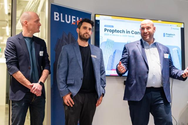 Three Kompas team members at a proptech conference
